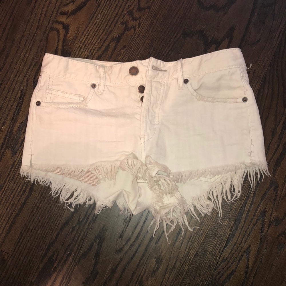 White Jean free people shorts. NEVER WORN